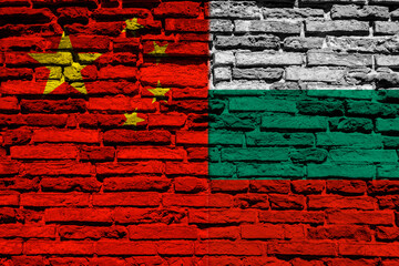 Flag of Bulgaria and China on brick wall