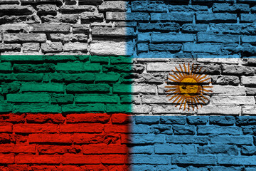 Flag of Bulgaria and Argentina on brick wall