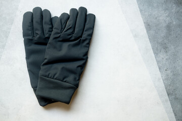 A pair of black gloves
