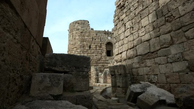 Moving camera among walls of Sidon Sea Castle in Sidon, Lebanon