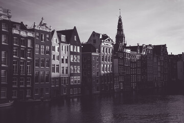 Fototapeta premium Amsterdam canal with typical dutch houses. Netherlands cityscape.