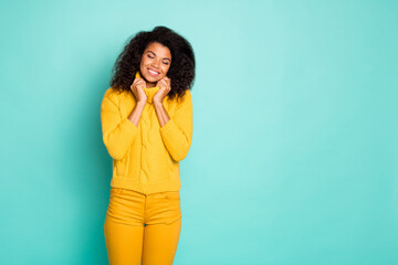 Portrait of her she nice attractive lovely peaceful sweet cheerful wavy-haired girl enjoying wearing warm cosy knitted sweater isolated over bright vivid shine vibrant green blue color background