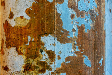 abstract art wallpaper from rusty metal with blue background.