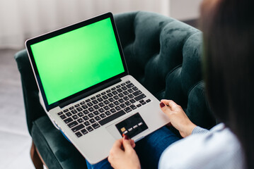 Close up hand of women buying online with credit card.