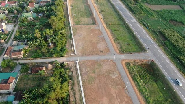 Aerial forward drone view of ruralscape, small simple community from rural district of Ngi Loc in Vietnam
