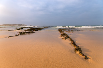 Fototapeta na wymiar Sunset at Baleal beach in Peniche, Atlantic coast of Portugal.