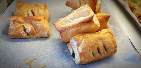 Tuna pie, Spinach and Cheese Pie on white paper for sale at dessert shop - Bread food 