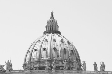 Fototapeta na wymiar Black and white photo of Saint Peter's Basilica in St. Peter's Square, Vatican City. Vatican Museum, Rome, Italy.