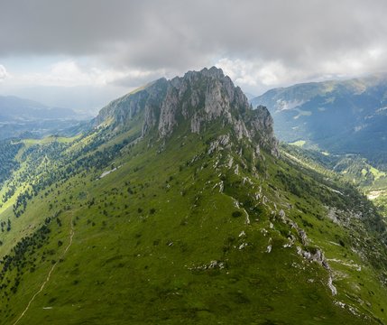 Aerial view of Cima di Bares and Valzurio valley at the foothills of Pizzo della Presolana. Castione della Presolana, Bergamo province, upper Val Seriana, Lombardy, Italy.