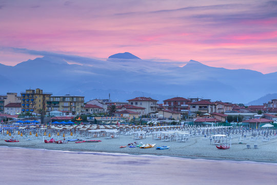 Sunrise on Lido di Camaiore beach and Apuan Alps, Lucca province, Versilia, Tuscany, Italy, Europe