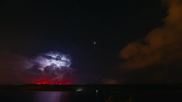 Fantastic starry sky during a thunderstorm. Scenic footage of magic astro photography. 