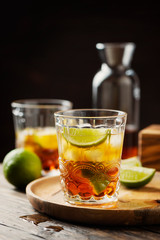 Strong golden rum with lime and ice