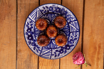 French pastry Caneles de bordeaux rum and vanilla flavor thick caramelized..