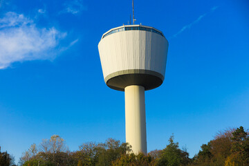 View on isolated 55 meter high water tower through against blue sky. Tower function as reservoir for 2000 cubic meter water. Viersen, Dülken (Duelken), Germany