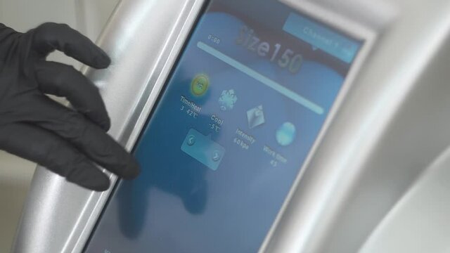 Сryolipolysis, setting up the apparatus for the cryolipolysis procedure. screen with menu