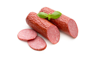 Salami smoked sausage, basil leaves on white background cutout.