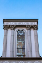Jesus art on Cathedral colorful window facing the sunlight