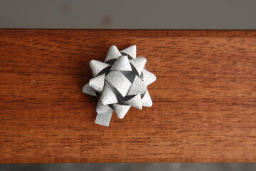 gray gift tie on wooden background