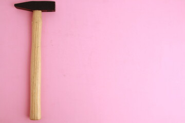The claw hammer in colorful background