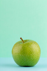 Creative layout made of green apples. Flat lay. Food concept.