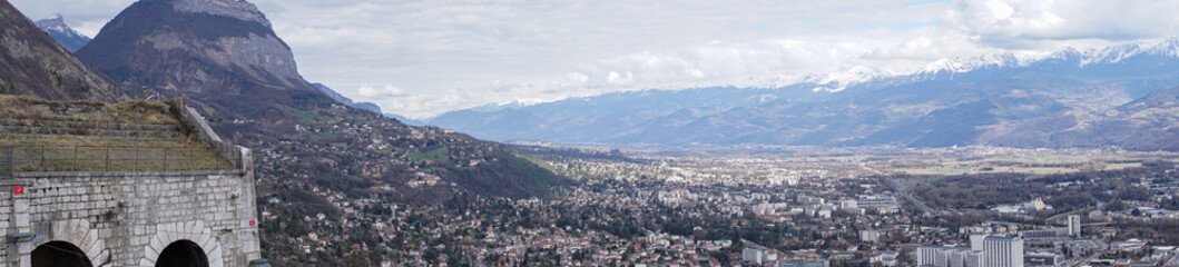 Fototapeta na wymiar Bastille view of Grenoble. Belledone and Dent de Crolles Mountains. France