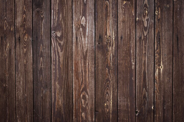 Old timber planks. Wood material, texture. Wooden rough surface. Dark board pattern, grunge fence. Hardwood natural background. Brown fence with a knots and nails. Timber plank. Dirty wall backdrop. 