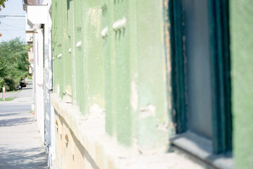 old house on a downtown street