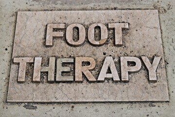 Foot Theraphy signage on the floor