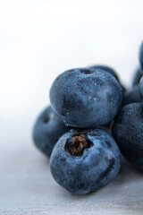 Blueberries  on a white table, shallow depth of field, macro