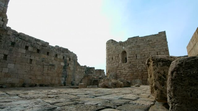 Moving camera among walls of Sidon Sea Castle in Sidon, Lebanon