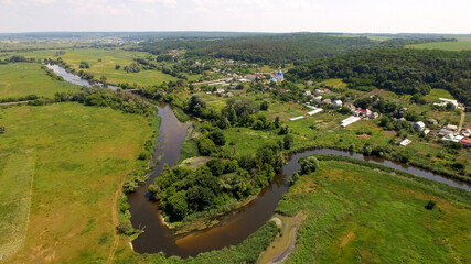 Aerial view of the river and field.
