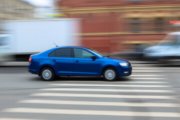 Fototapeta na wymiar blue car on the road