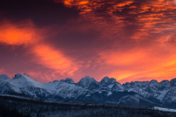 Amazing sunset in Lapszanka with a view to Tatra Mountains in Poland 