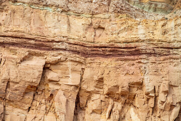 Reddish band of a different rock base is seen in the rock sculptured natural landscape of Capitol Reef National Park