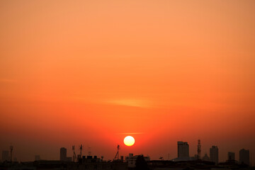 Sunset view Beautiful golden yellow sky in big cities