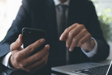 Businessman using smartphone