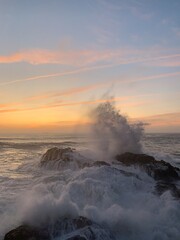 sea water hitting the stones