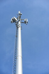 Fototapeta na wymiar Telecommunication Tower Antennas High Pole Signal Transmission Both Wireless Phone