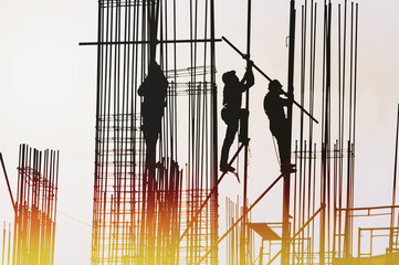 silhouette of man in front of office building