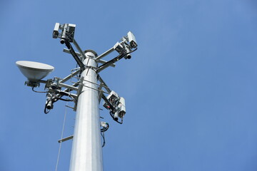 Fototapeta na wymiar Telecommunication Tower Antennas High Pole Signal Transmission Both Wireless Phone 