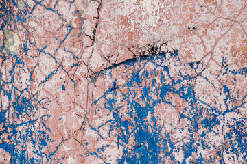 Background of old multicolored cracked paint. Background for designers