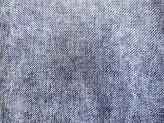 Closeup jeans fabric texture. Denim jeans background.