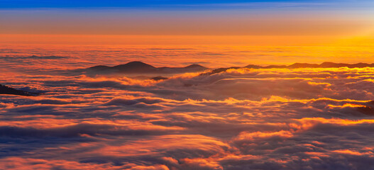 Fototapeta na wymiar sea of clouds at sunset. Romania, Carpathian mountain