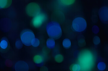 Abstract bokeh colorful illuminations on dark background