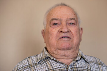 Portrait of an elderly man with thankful