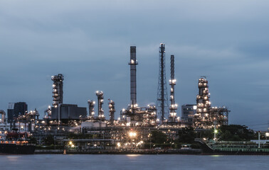 Oil refinery plant at night.