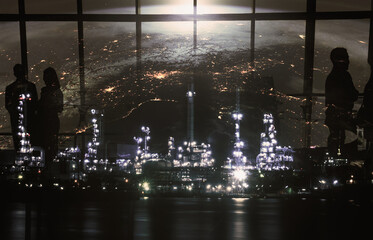 Oil refinery plant at night.