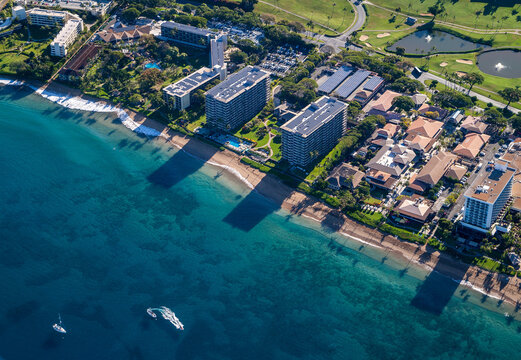 Aerial view on Kaanapali with beaches, resorts and boats.