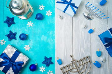 Christmas and Hanukkah celebration concept. Winter holidays background with gift boxes and...