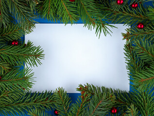 Fototapeta na wymiar Christmas frame mockup of christmas tree branches and white background inside.